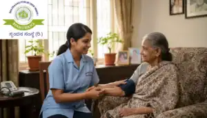 A compassionate Spandhana Public Trust nurse providing care to an elderly patient in a home setting in Bangalore
